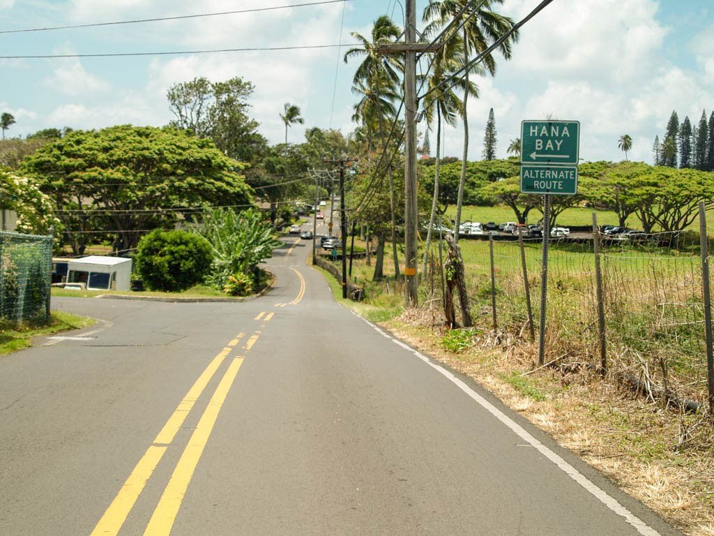 a sign on the side of a road